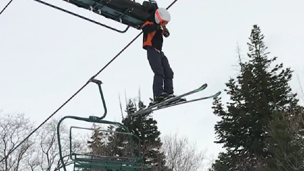 VIDEO Boy dangling from ski lift after backpack gets caught on chair