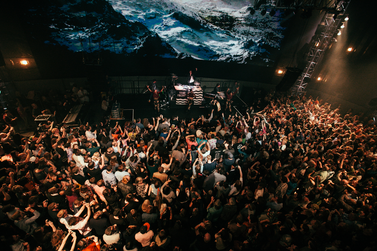 Macklemore and Ryan Lewis made a special appearance at EMP’s Vivid event for the new exhibition Spectacle. The new exhibit is all about music videos so in the spirit Macklemore and Ryan Lewis performed their award winning Thrift Shop and Can’t Hold Us to a screaming crowd. May 16th 2014. (Joshua Lewis / Seattle Refined)