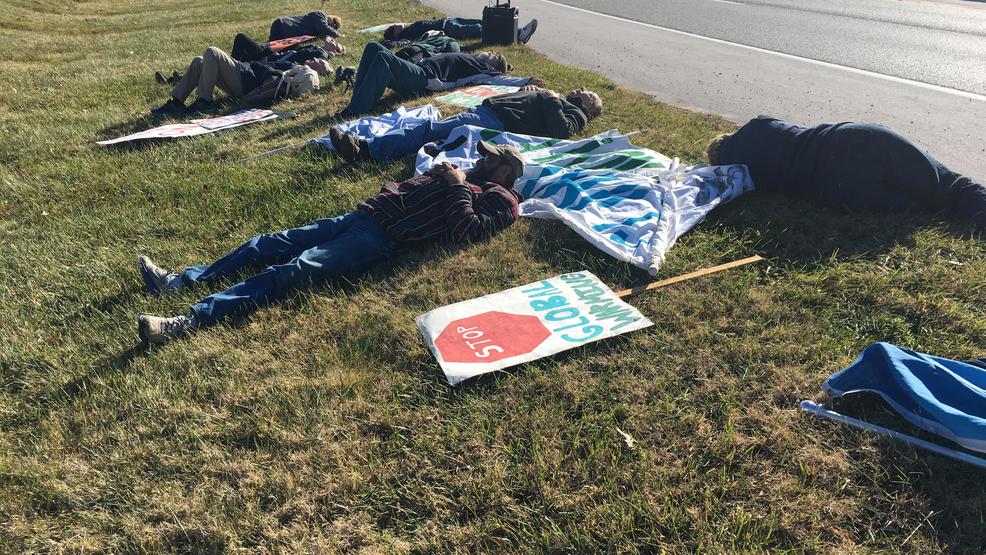 Columbia climate change activists hold die-in protest - krcgtv.com