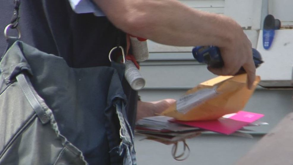 Letter carriers carry tools and tech to prevent dog bites KGAN