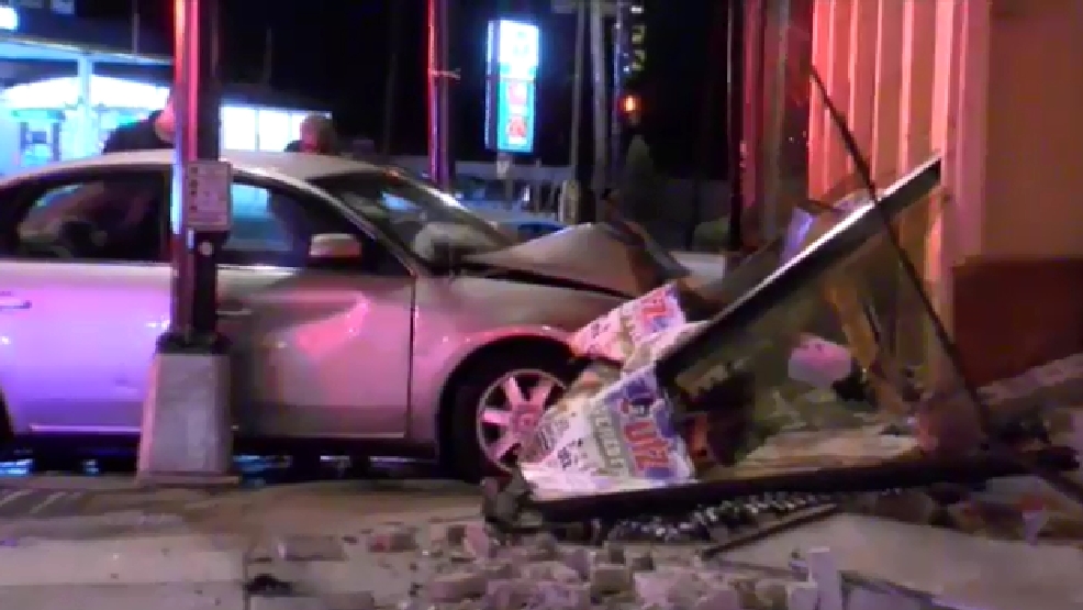 Officials 2 injured after car crashes into SE, DC building WJLA