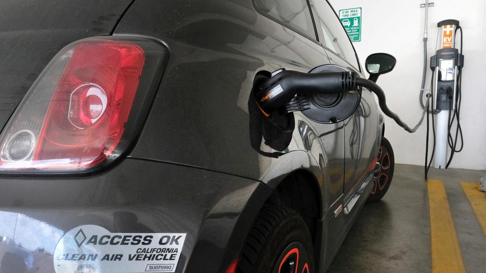 California Seeks To Boost Electric Car Rebate Program Komo This April 25 2016 Photo Shows An Electric Fiat Plugged Into A Charging Station In Parking Lot Los Angeles California Could Spend Up To 3 Billion